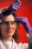 sym_woman_looking_at_test_tubes.jpg