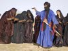 nigel-pavitt-timbuktu-a-group-of-tuareg-men-and-women-sing-and-dance-near-their-desert-home-mali.jpg
